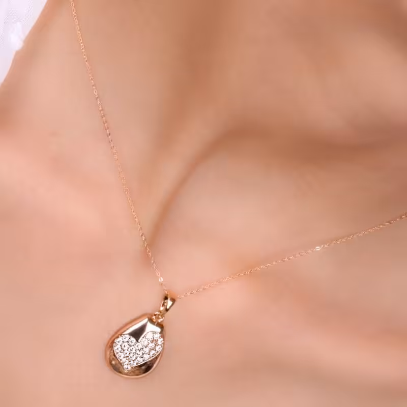 نیمست ژوپینگ طرح قلب نگین دار روی قاب طلایی رنگ ثابت و ضد حساسیت