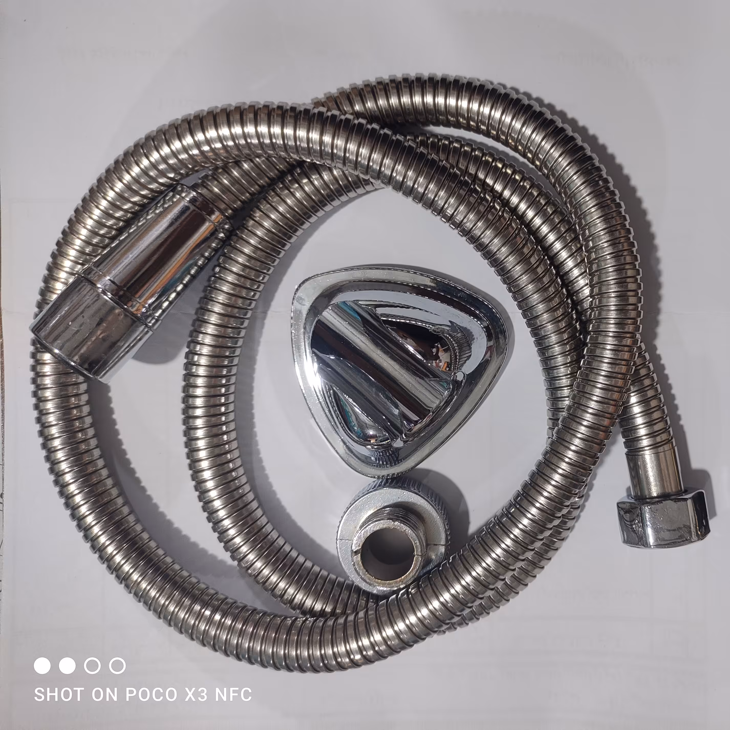 شلنگ توالت مهره برنجی فنری استیل