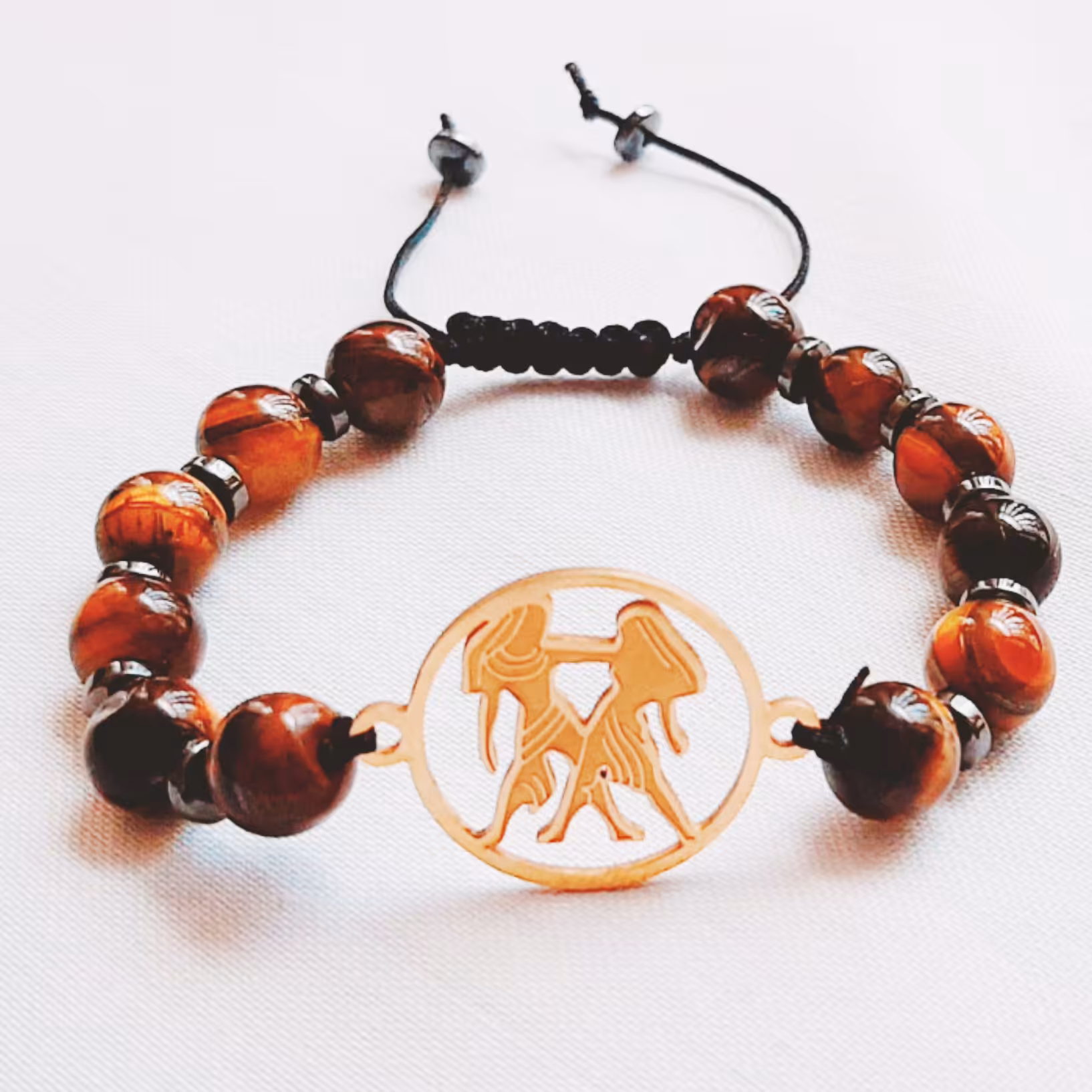 دستبند نماد استیل  ماه خرداد با سنگ چشم ببر و حدید واشری