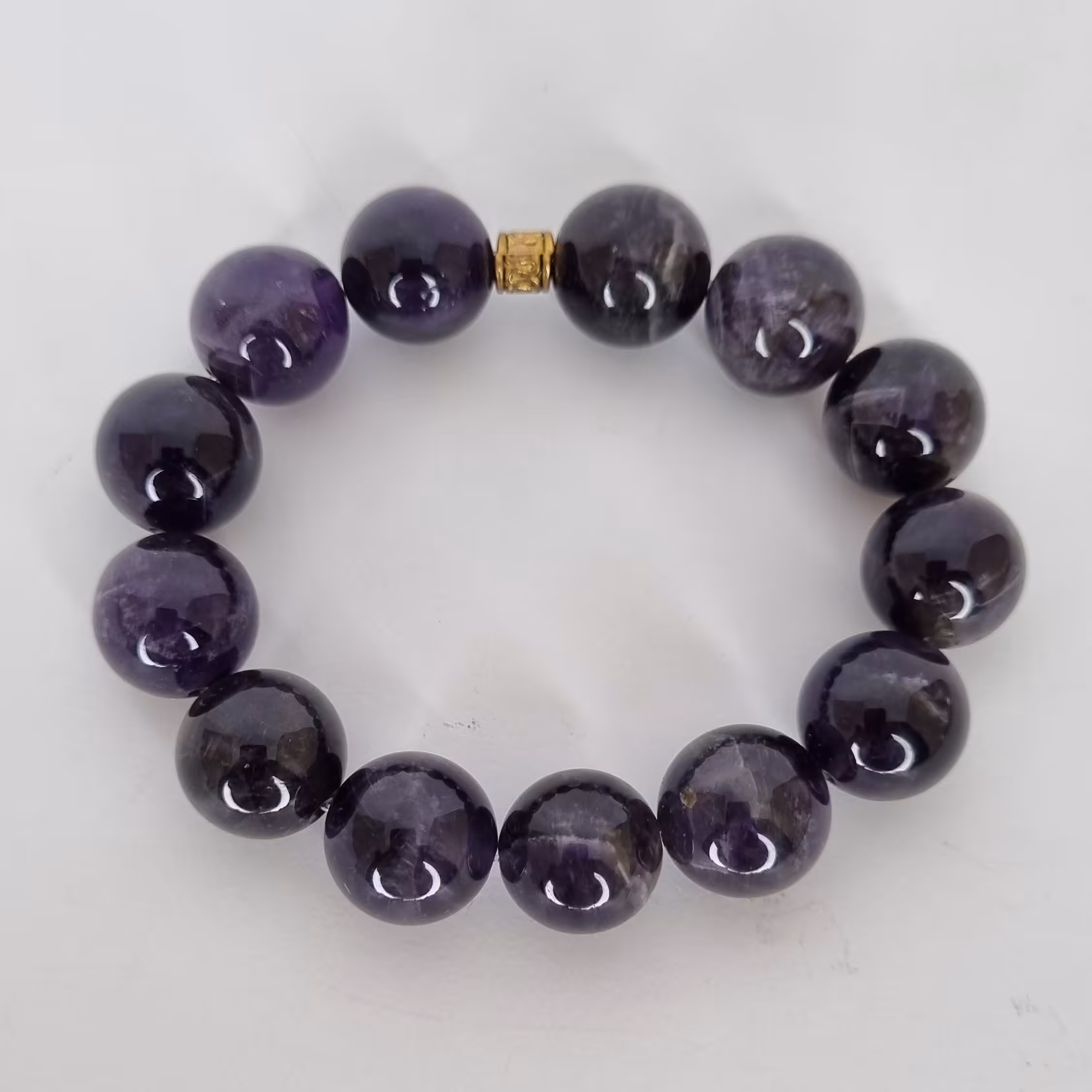 دستبند مهره 12 آمیتیست برزیلی اصل با کش دولایه