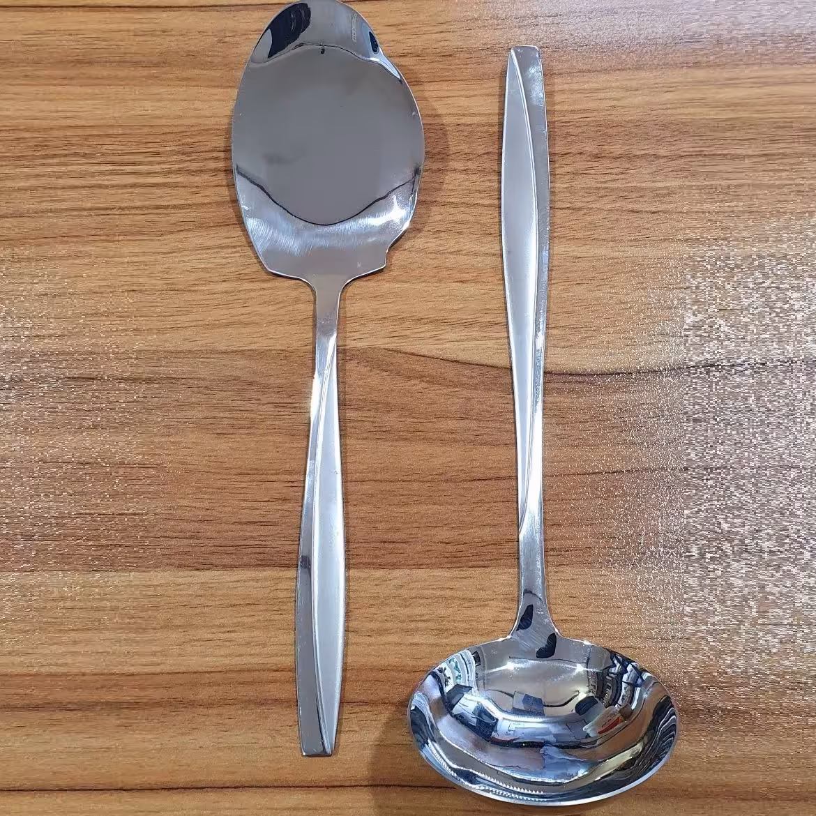 کفگیرملاقه استیل نگیر درجه یک باکیفیت کفگیر ملاقه کفگیر یاملاقه دونه ایی در مشهد لوازم خانگی کمالی حداقل فاکتوربالای500ت