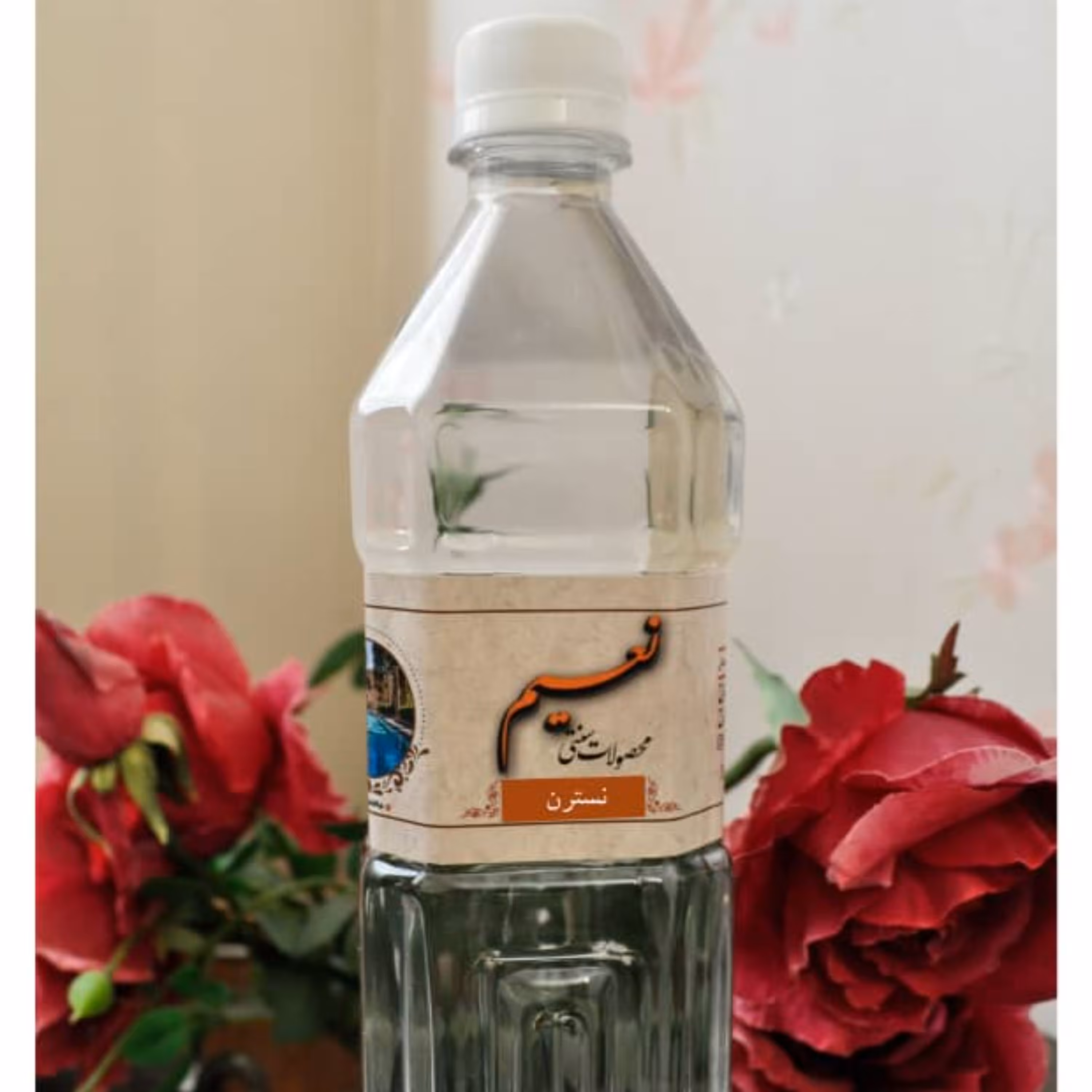 عرق نسترن درجه یک کاشان(900 گرمی)