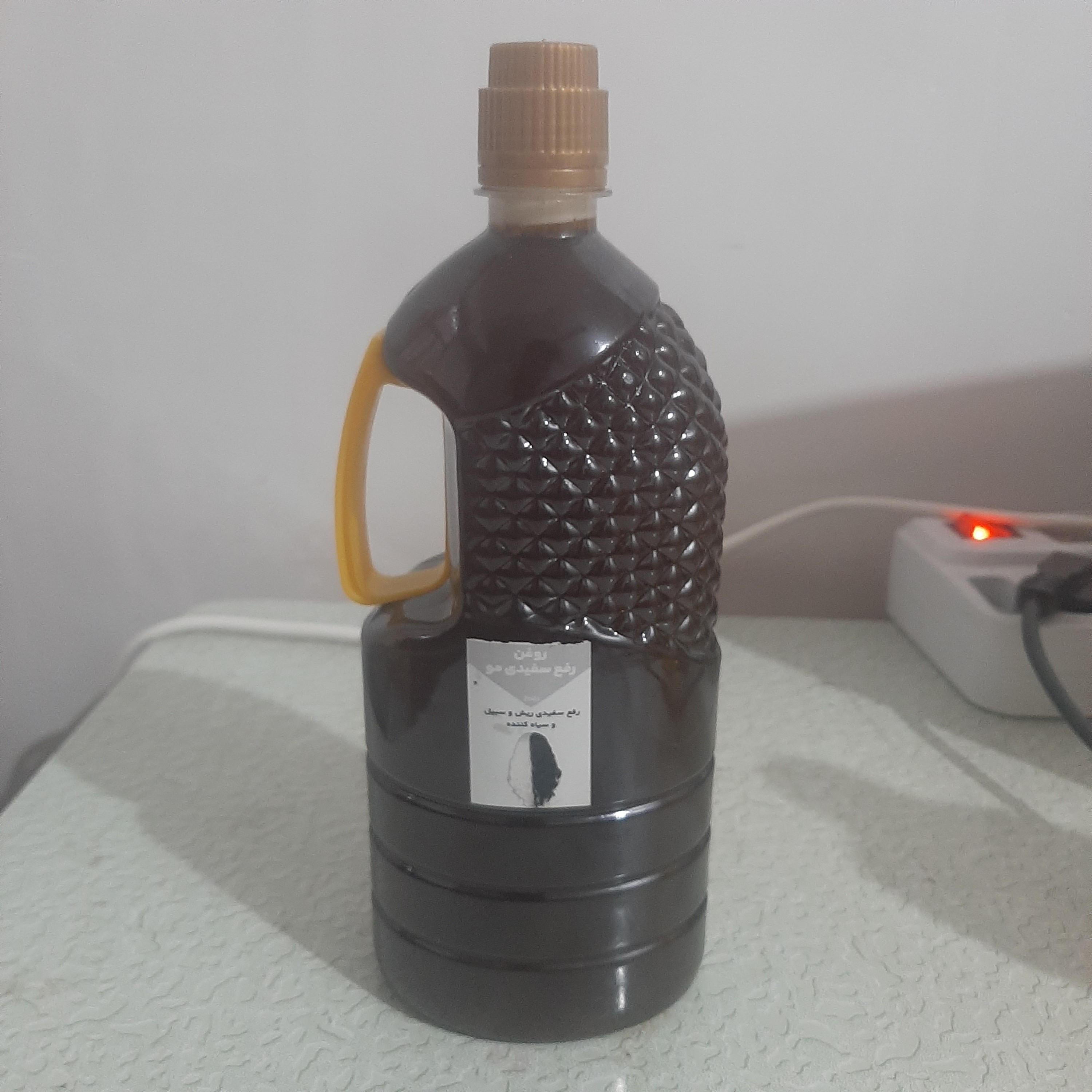 روغن ترکیبی رفع سفیدی مو یک لیتری (سفیدی مو سفیدی ریش و سبیل ضدسفیدی مو رنگ مو سیاه کننده مو)