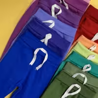 شلوار پنبه کبریتی برند بامشی کیفیت عالی قد 50 سبز و قد 54 پرتقالی روشن شلوار راحتی شلوار خانگی دخترانه و پسرانه 