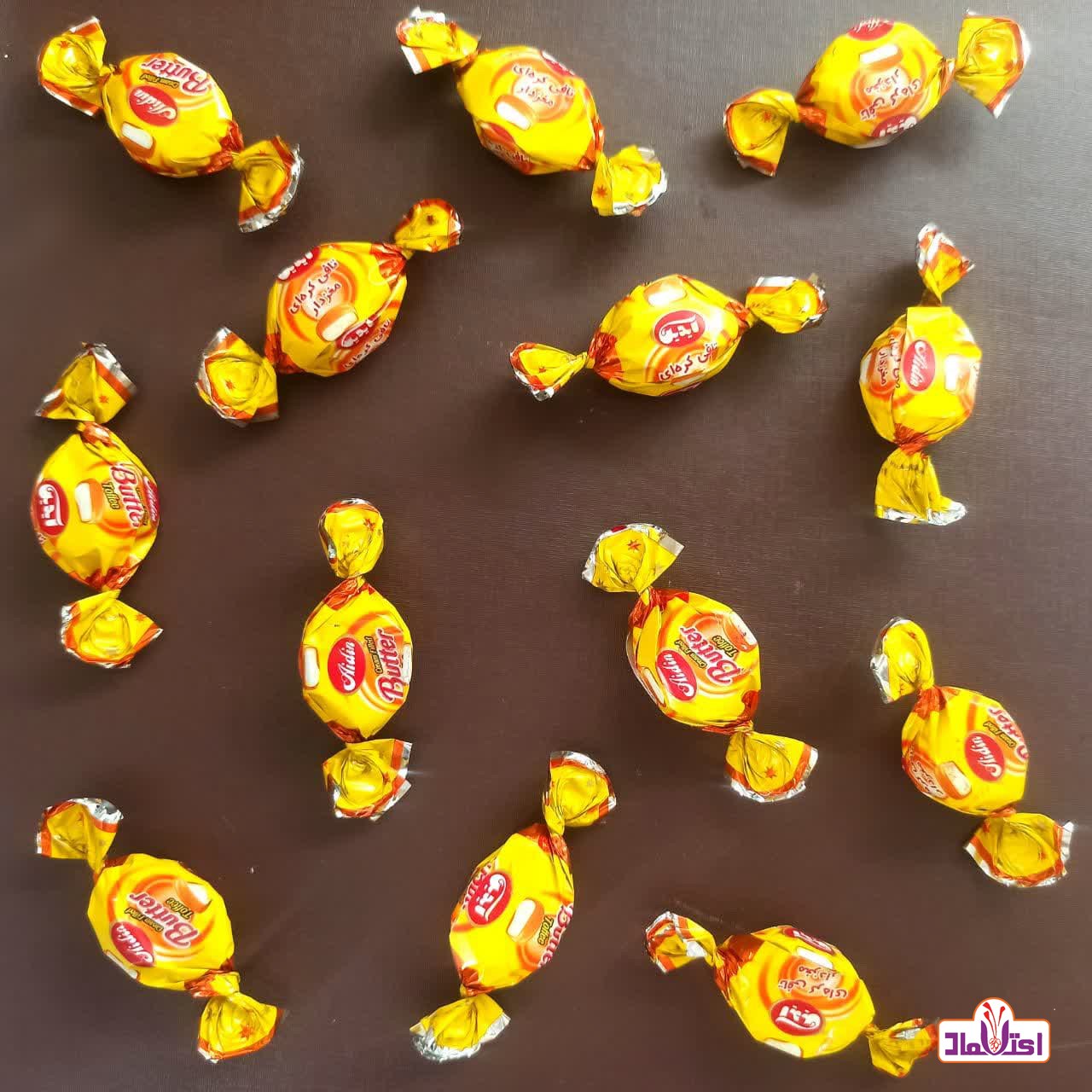 تافی کره ای 100 گرمی آیدین (مغزدار کره ای )