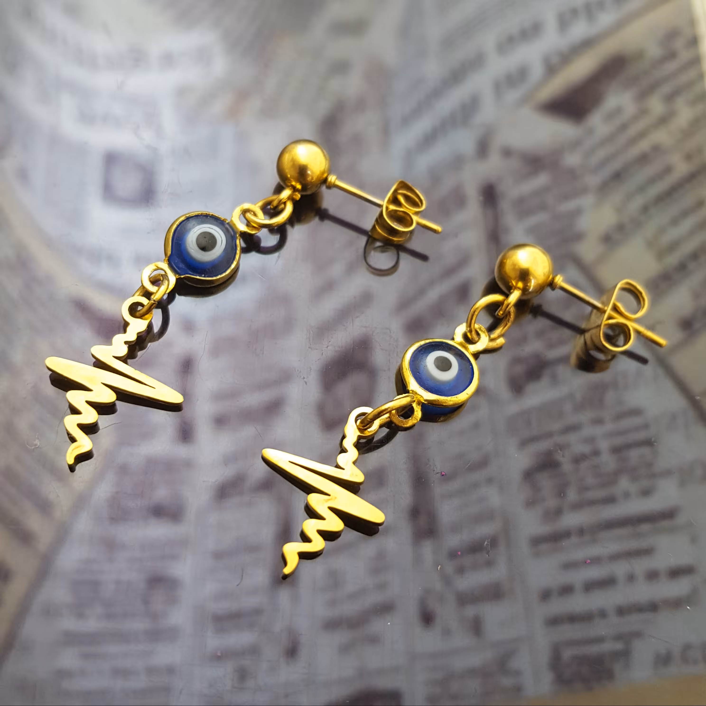 گوشواره میخی چشم نظر و ضربان استیل ضد حساسیت روکش طلا رنگ ثابت کد 409