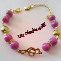 بدلیجات دستبند ماهی طلایی وکلیپ سل تزئین شده با مهره های صورتی واویز سیب طلایی 