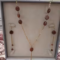 نیم ست استیل  گردنبند و گوشواره سنگ دلربا ب همراه اوییز بلند زنجیری رنگ ثابت