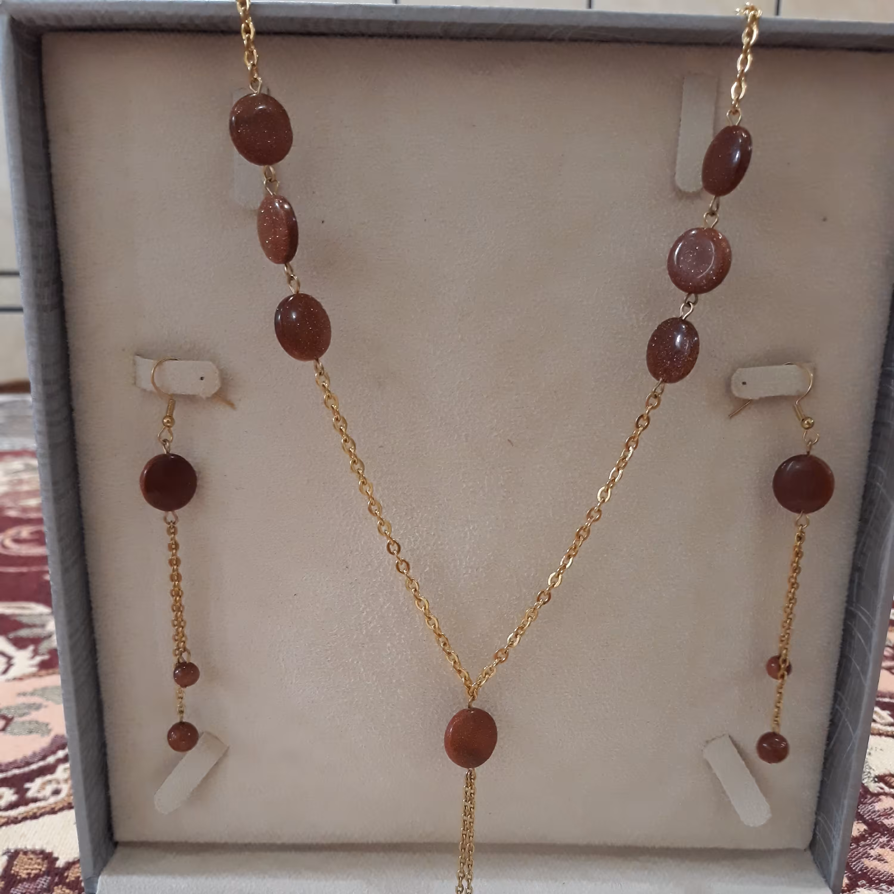 نیم ست استیل  گردنبند و گوشواره سنگ دلربا ب همراه اوییز بلند زنجیری رنگ ثابت