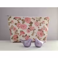 کیف لوازم آرایش آنام طرح گل صورتی