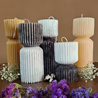 شمع استوانه شیاردار در طرح ها و رنگهای مختلف ارتفاع 15 سانت