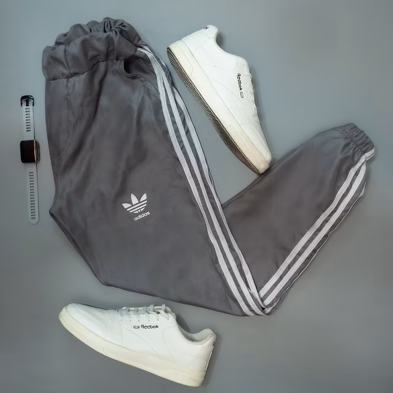 پکیج شلوار اسلش Adidas مردانه طوسی مدلNEMO	ساعتLED طوسی مدل W330