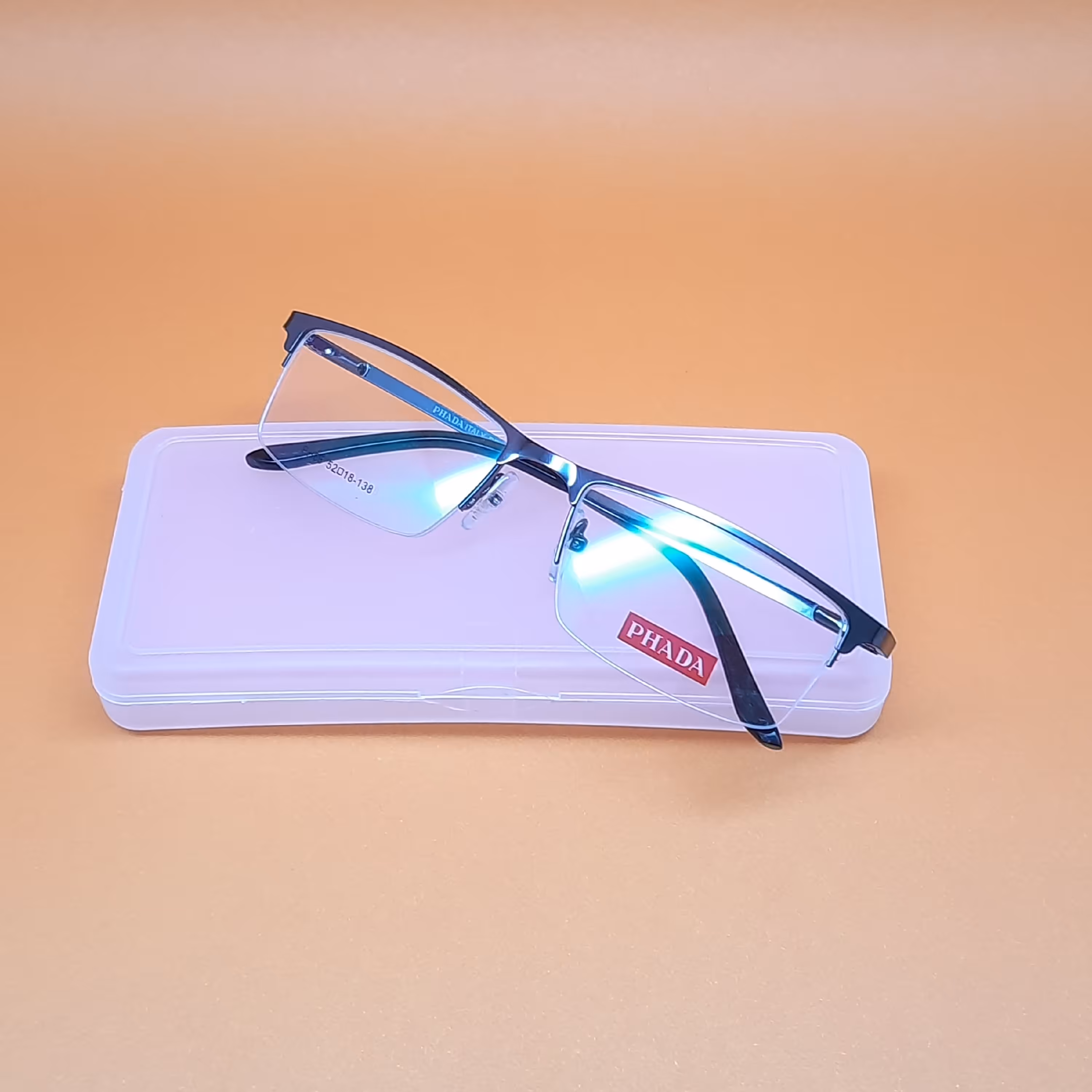 عینک طبی  نمره دار جنسیت فریم نیمه قاب فلزی  دسته فنری  نمره 1 الی 4 آستیگمات