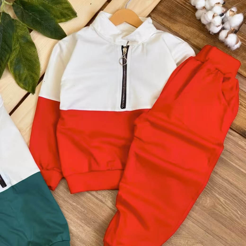 بلوز شلوارسوییشرت شلوار پسرانه دخترانه دورس نیم زیپ  سایز 45و50 در 3 رنگ سبز  و قرمز ومشکی