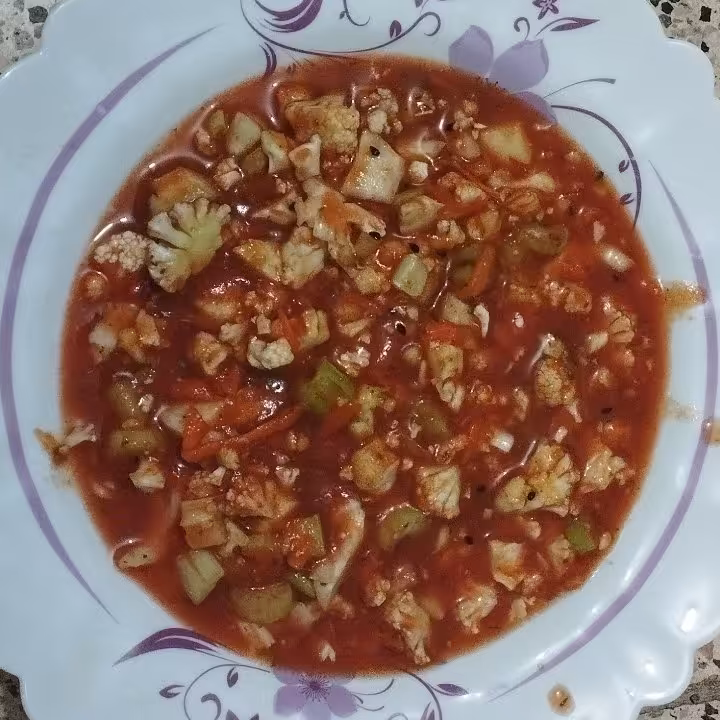 ترشی خانگی  آب گوجه با وزن یک کیلو 