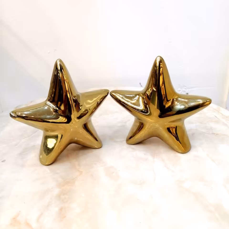 مجسمه و تندیس اکسسوری ستاره سرامیکی آبکاری طلایی