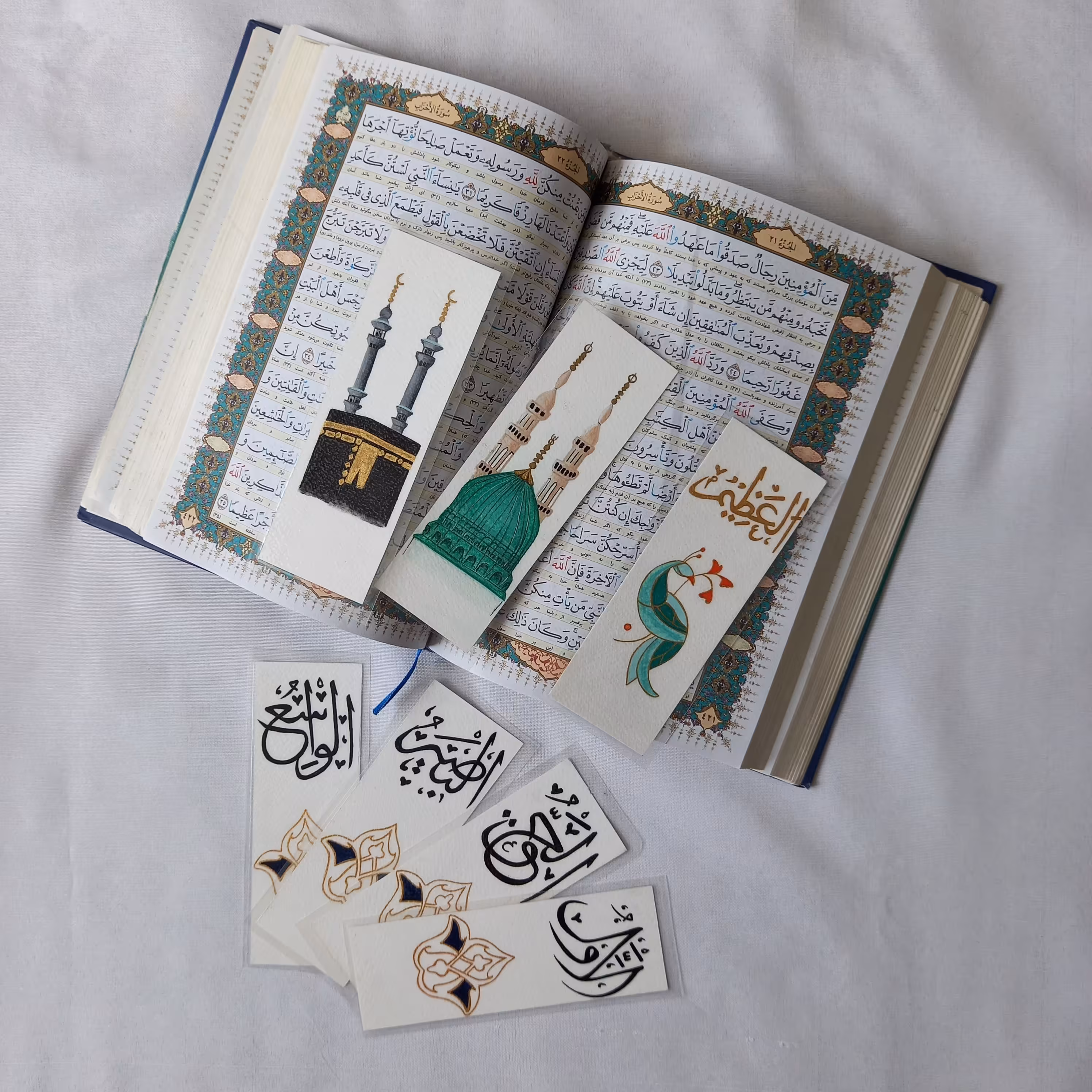 پک هفت تایی بوک مارک یا نشانگر  کتاب یا قرآن نقاشی شده با دست و تکنیک آبرنگ طرح تذهیب  مناسب نشانه گذاری کتاب و هدیه داد