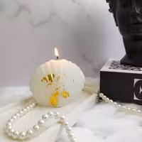 شمع صدف با ورق طلا 