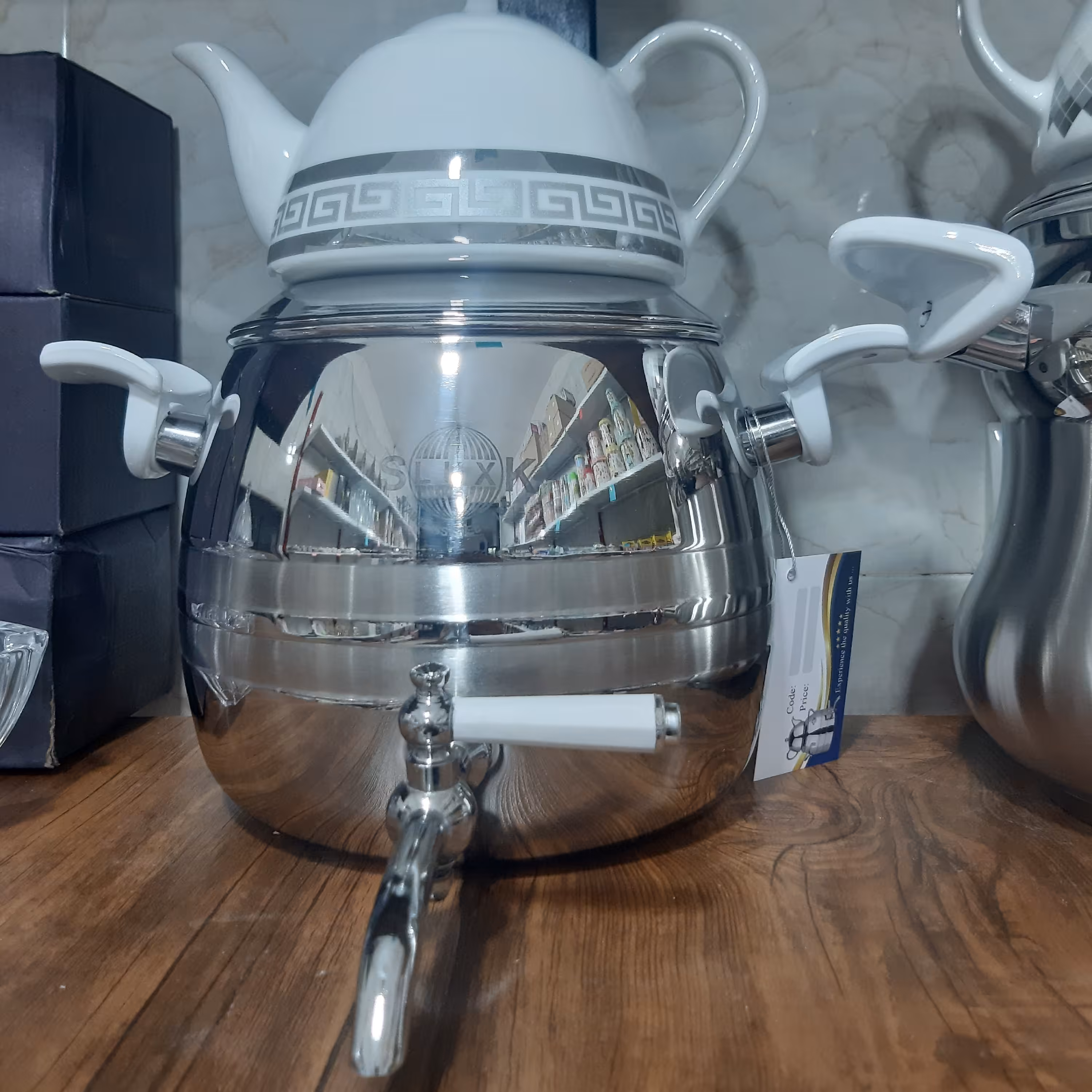 کتری قوری برندSLUXK شیر دار ،کف چدن با قوری چینی ،ارسال طرح قوری رندوم است