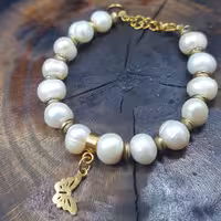 دستبند مروارید اصل پروانه همراه با یراق استیل رنگ ثابت کد 570