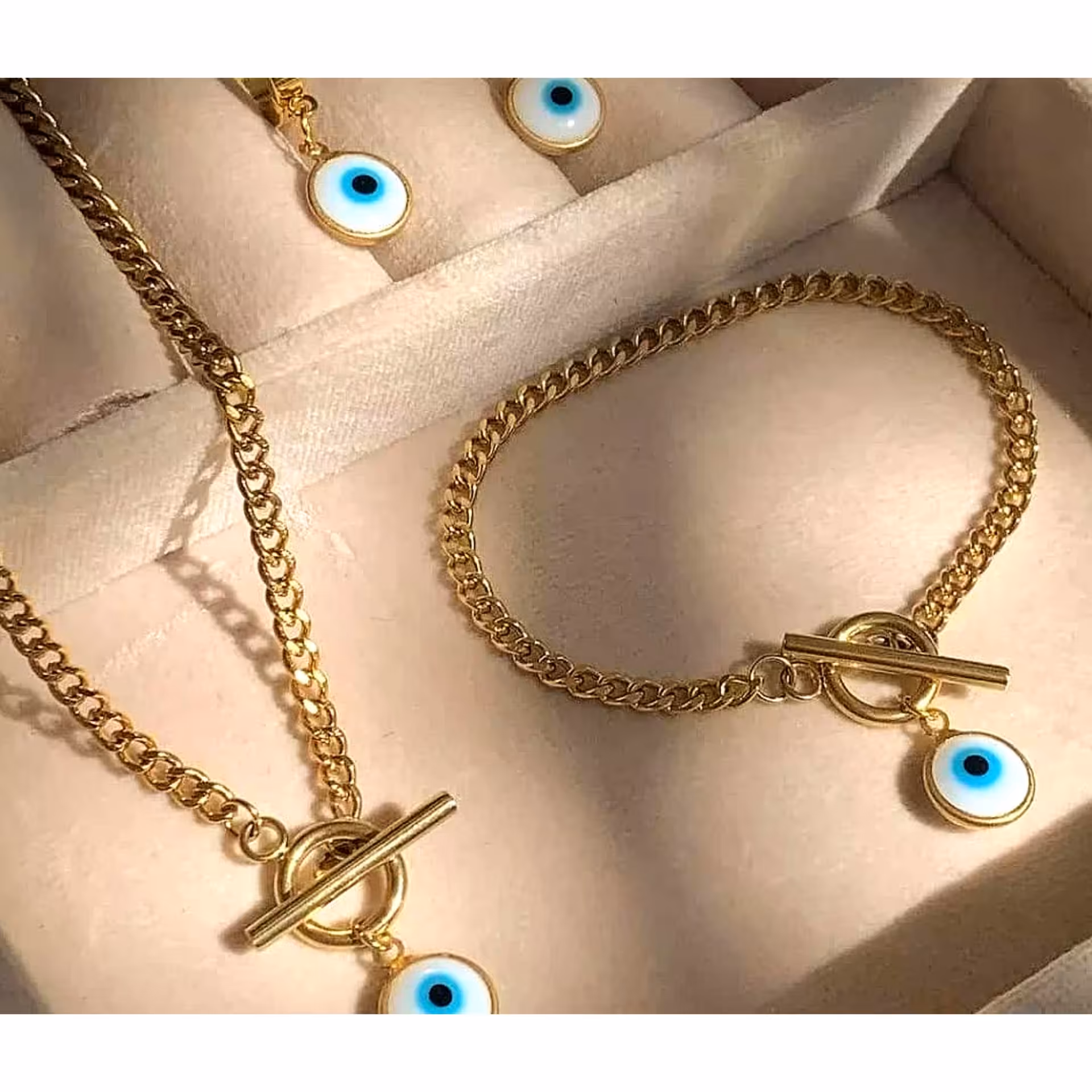 ست کارتیر استیل با آویز چشم نظر،تست واکتس شده،رنگ ثابت،ارسا رایگان،مناسب استفاده روزانه دائم وهدیه،بدلیجات استیل