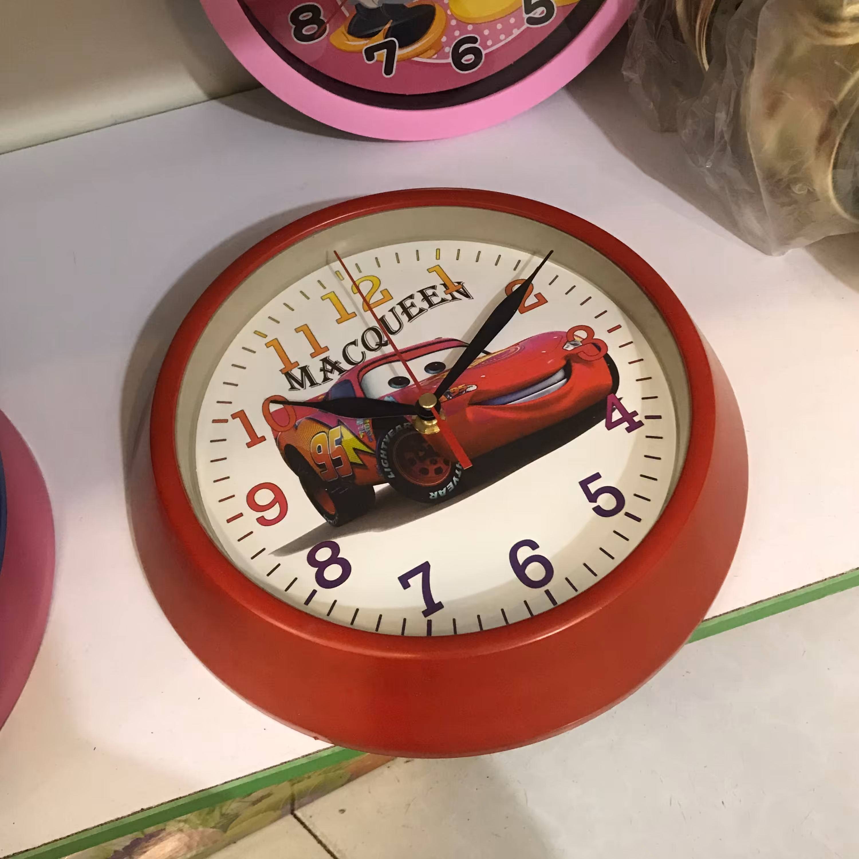 ساعت دیواری طرح کودک قطر25 سانتی لبه فلز