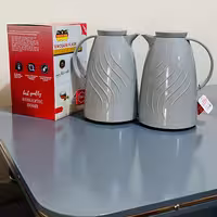 فلاسک دو لیتری خارجی ضمانتی 24ساعت ماندگاری گرما و سرما مخزن صورتی 