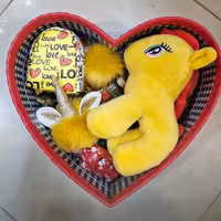 باکس هدیه (عروسک یونیکورن. پاپ سوکت پشمالو .کیف هندزفری. دسته کلید پشمالو. کپسول عشق. اسمارتیز )