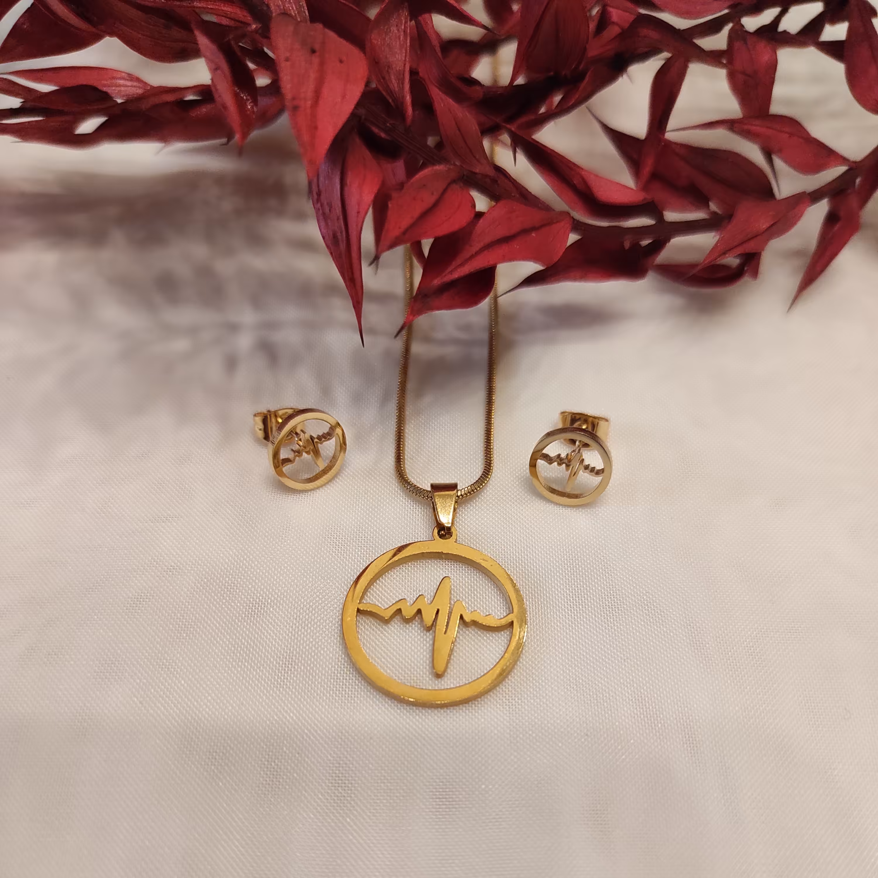 نیم ست استیل طرح ضربان طلایی