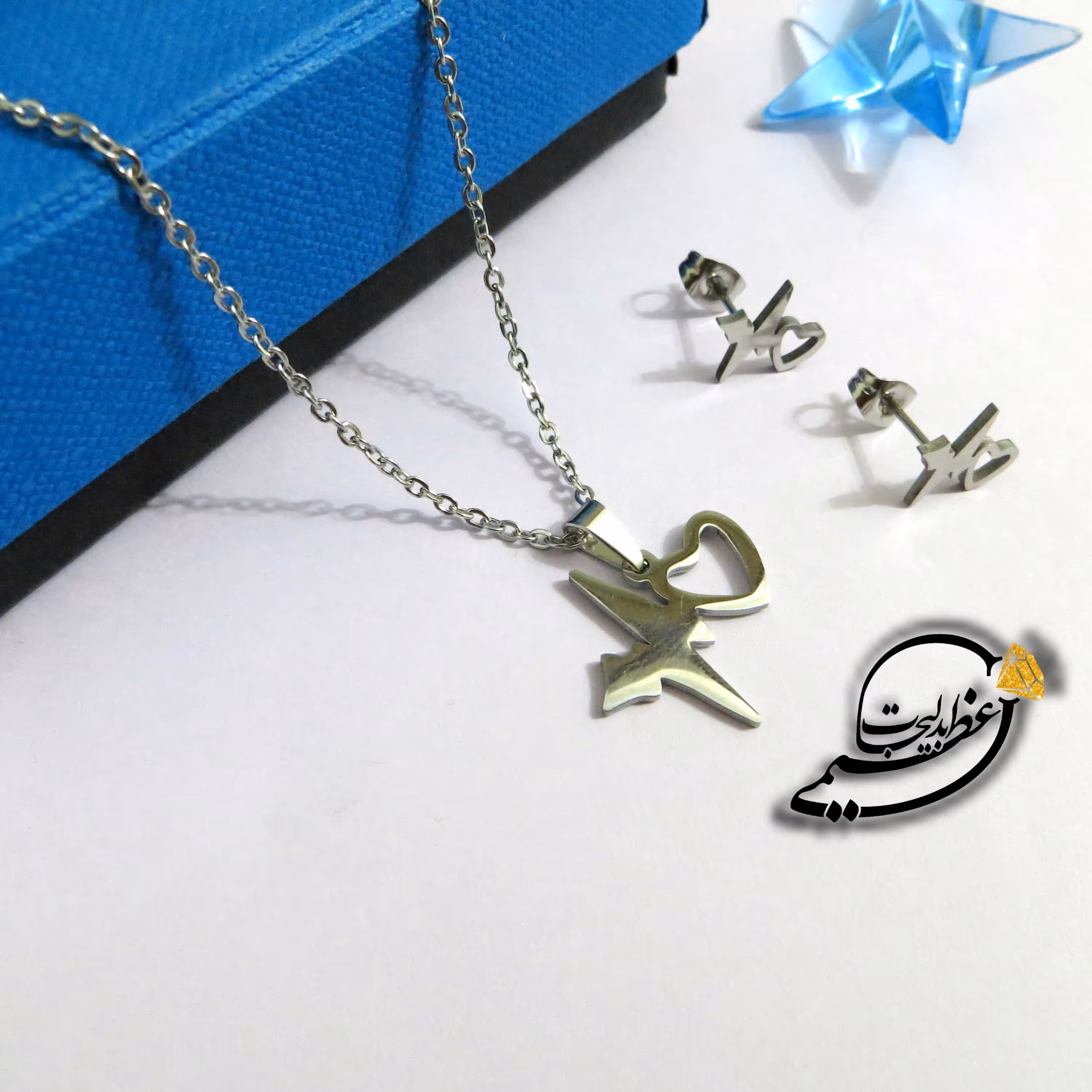 نیم ست طرح ضربان قلب و قلب استیل رنگ ثابت نقره ای رنگ