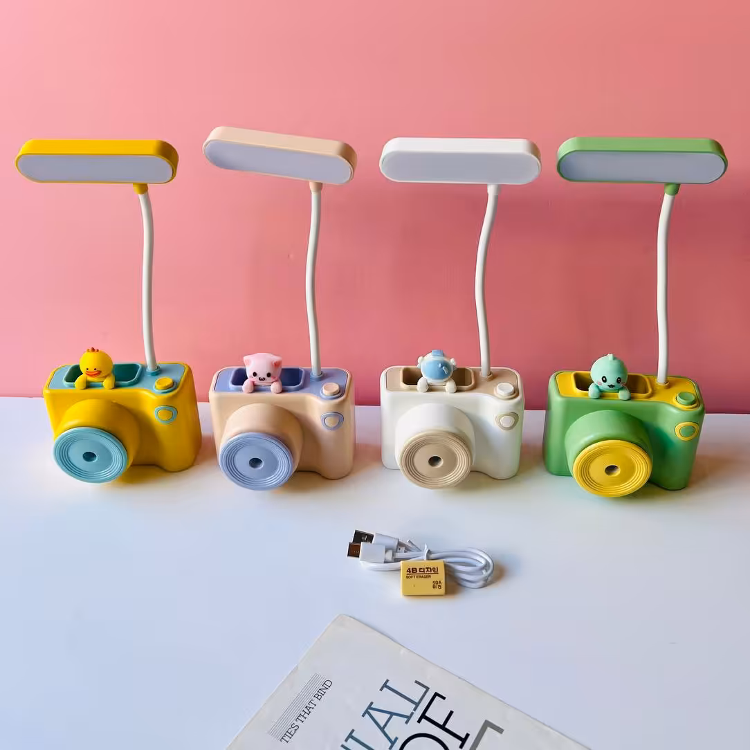 چراغ مطالعه یا چراغ خواب شارژی طرح دوربین فانتزی  وارداتی تراش دار پاکن دار  جامدادی سه کاره وارداتی 