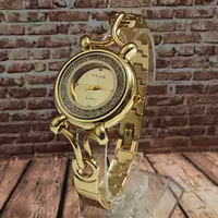 ساعت  والار زنانه طلایی زمینه طلایی