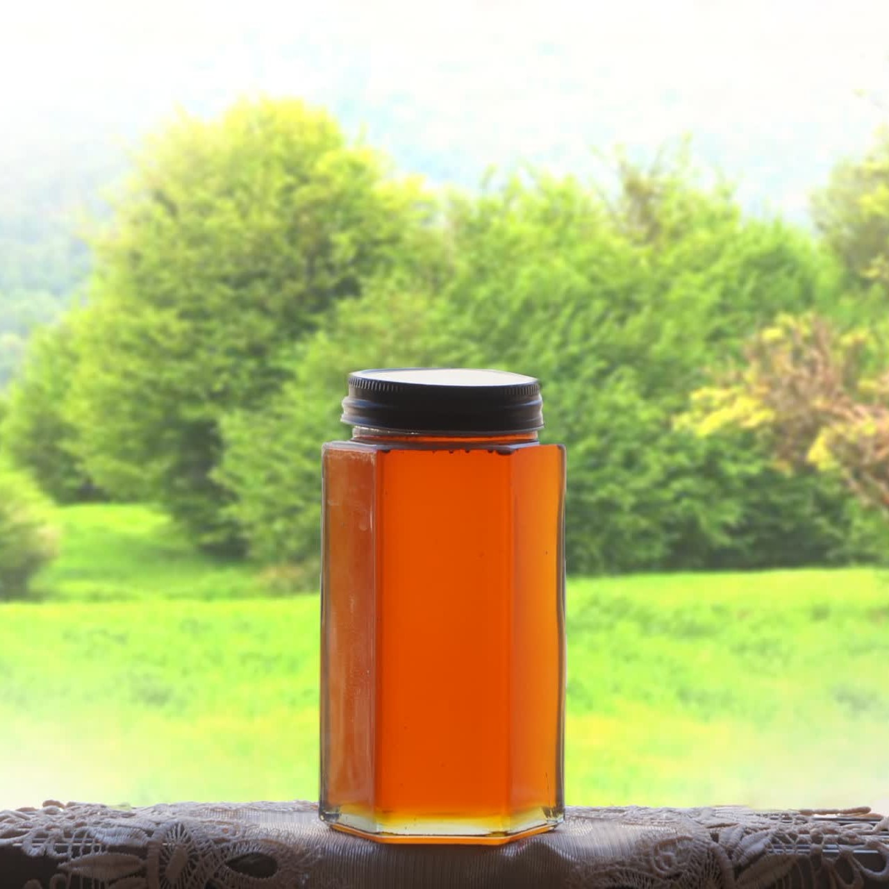 عسل معطر بهارنارج استان فارس صادراتی 700 گرمی ظرف شیشه خرس-خور ارسال رایگان ضمانت مرجوعی
