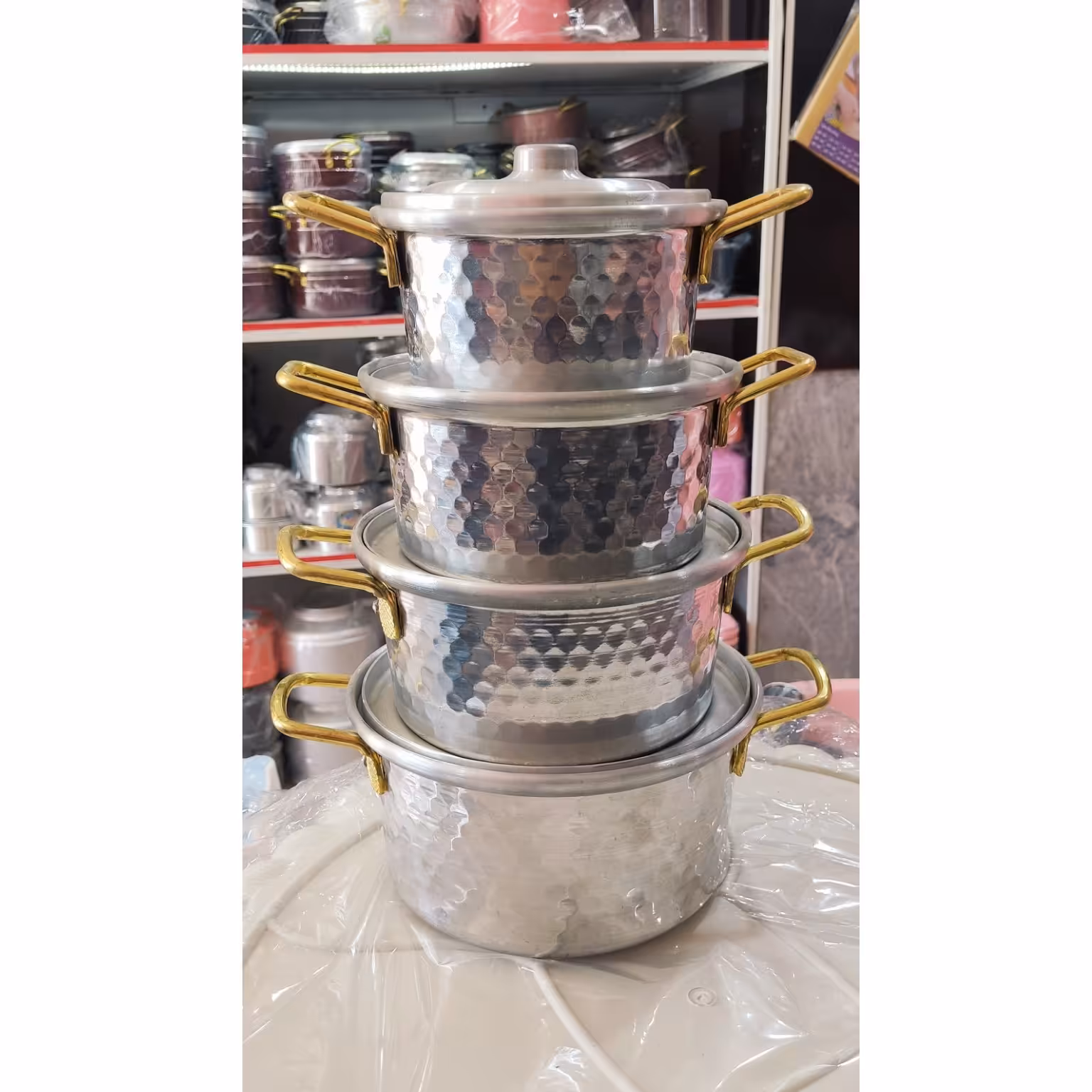 سرویس قابلمه روحی چکشی 4تایی دسته طلایی