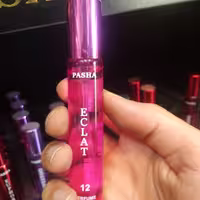 عطر جیبی زنانه پاشا رایحه اکلت حجم 22 میل