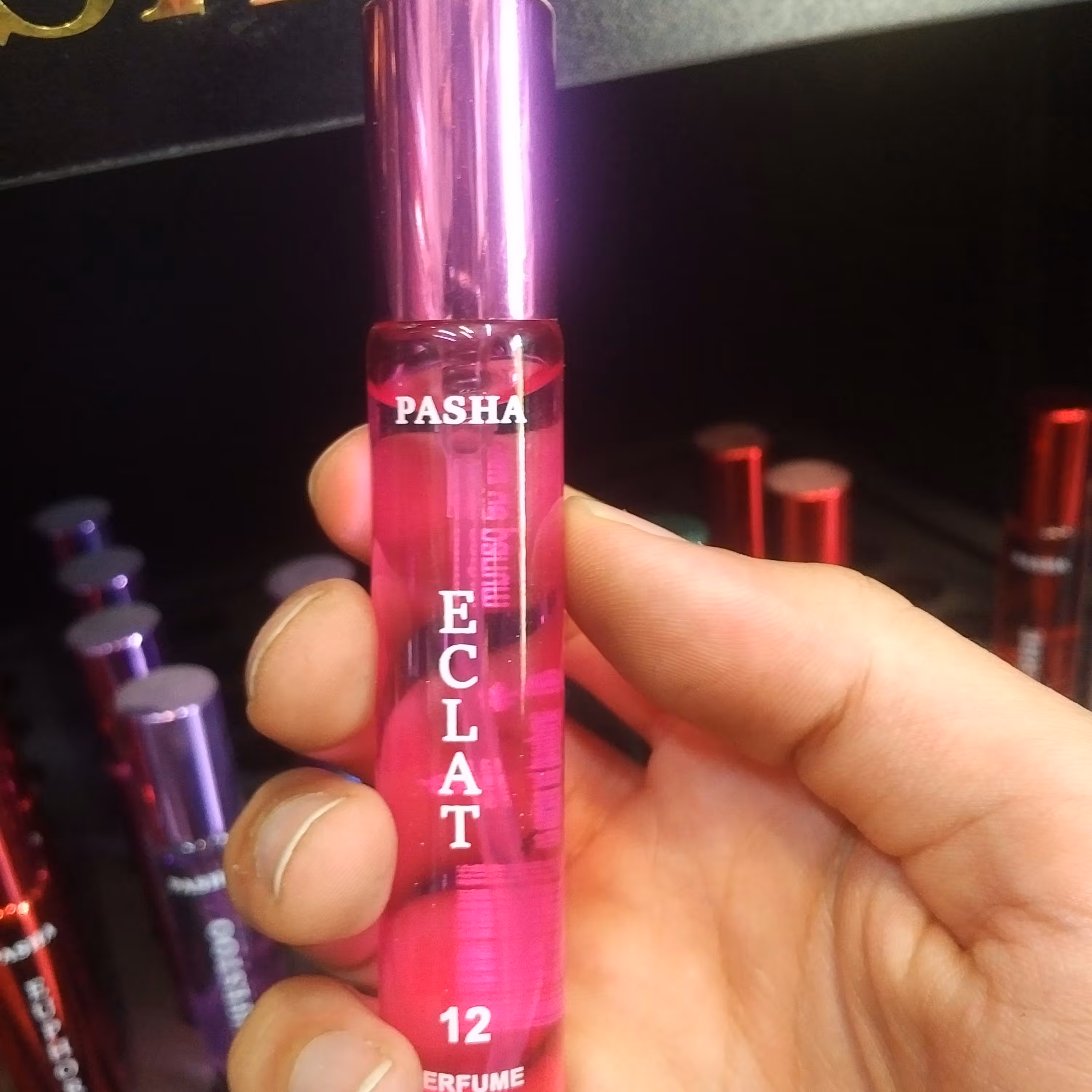 عطر جیبی زنانه پاشا رایحه اکلت حجم 22 میل