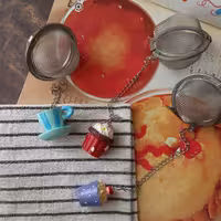 صافی یا توری چایی و دم نوش جنس استیل با طرح فانتزی قابل شست وشو