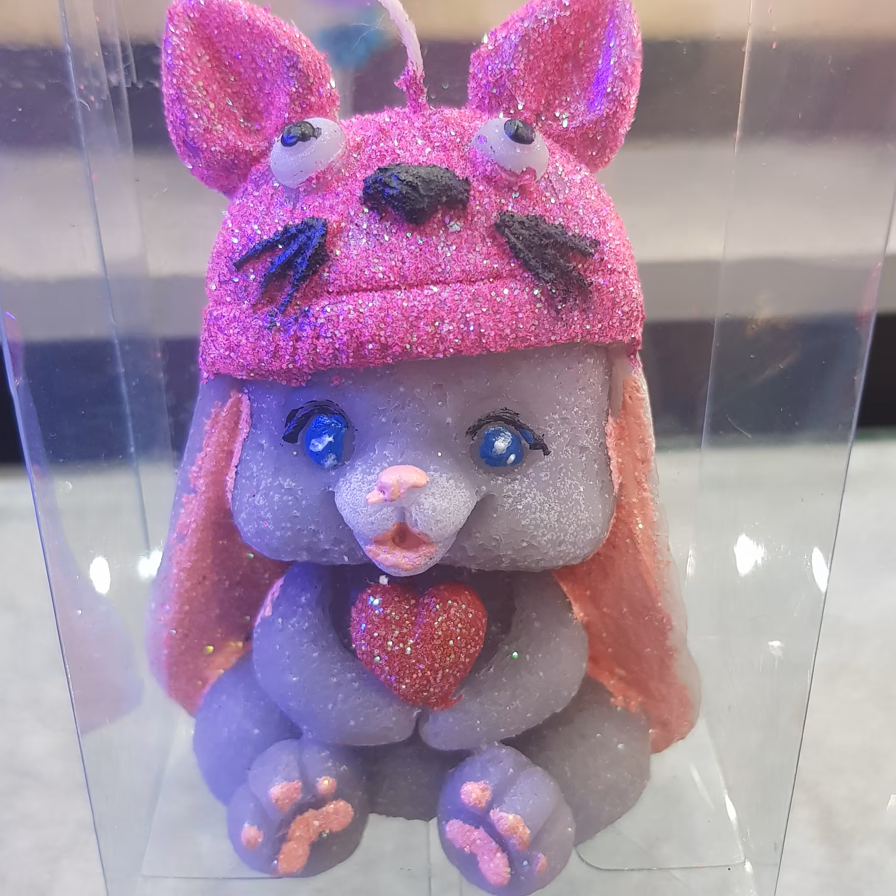 شمع خرگوش تک در رنگ های آبی صورتی و نارنجی در وزن حدودا 85 تا 90 گرم