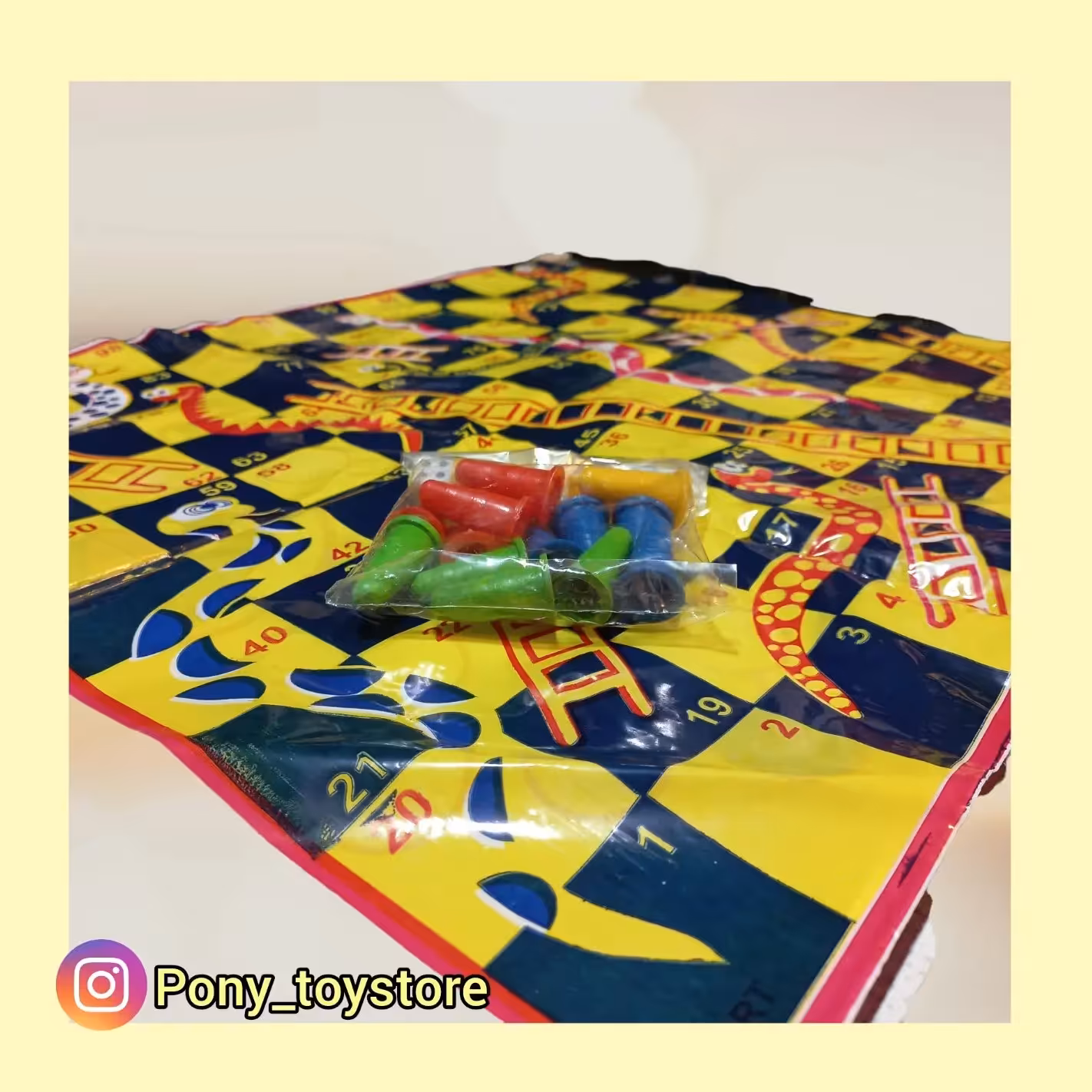 بازی منچ و مار پله سفره ای با مهره های کوچک