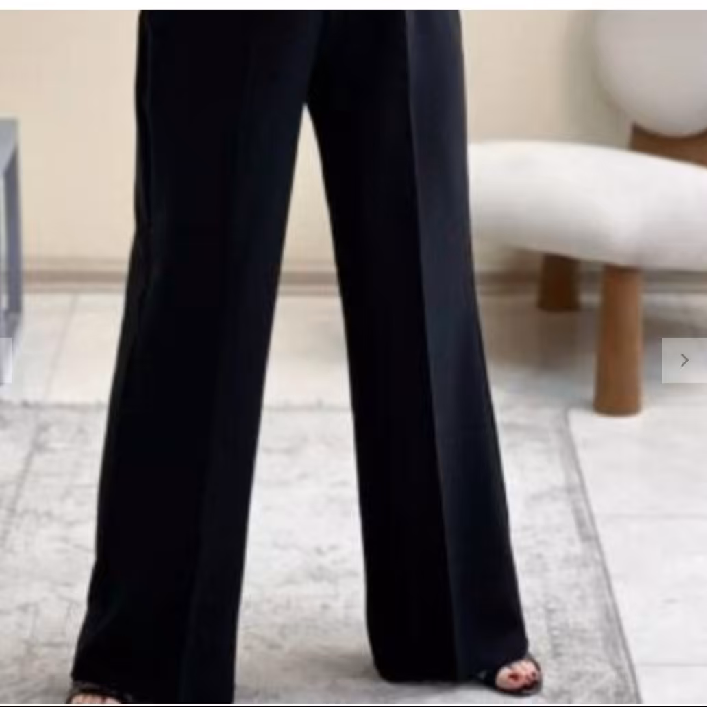 شالوار نیم بگ مشکی سه سایز مناسب 38الی 52 جنس کرپ مازراتی درجه یک رنگ مشکیضمانتی