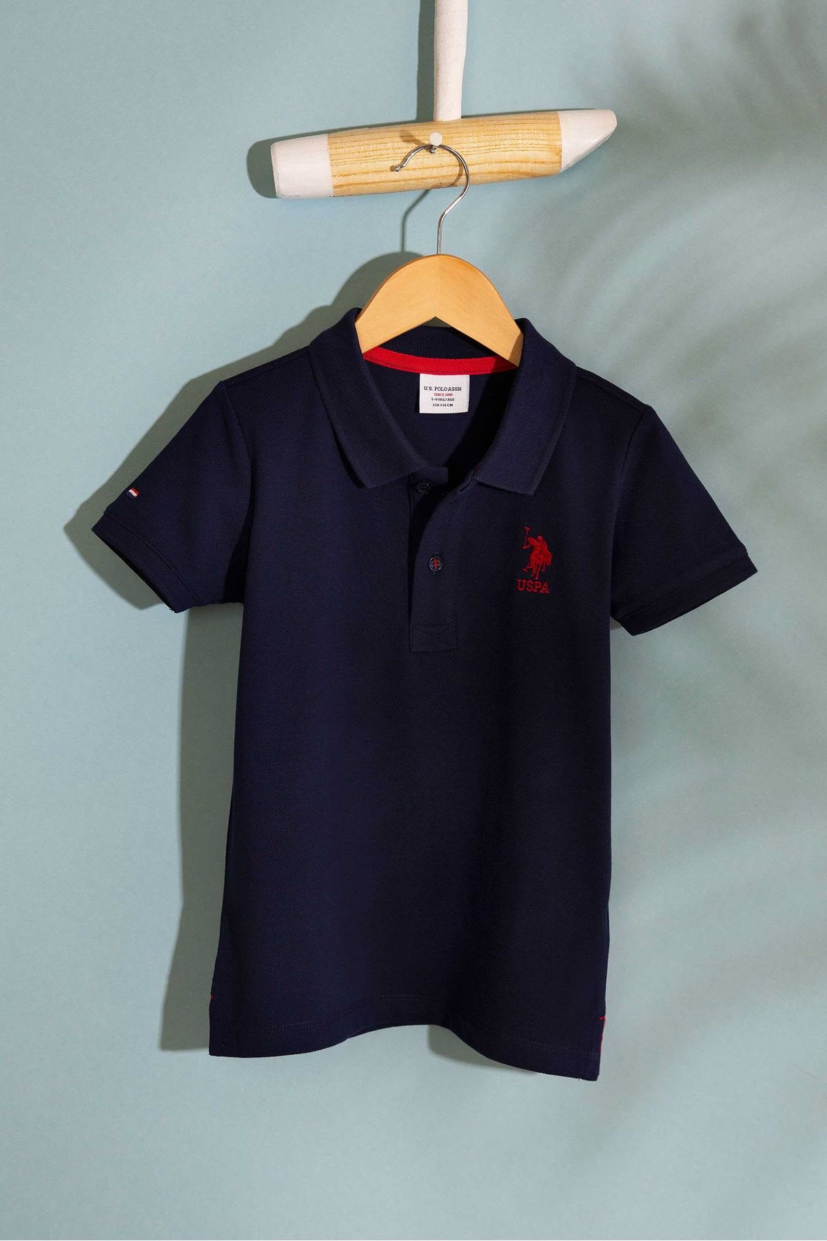 تی شرت یقه پولو آبی پسرانه و بچگانه ناوی بلو پایه U.S. Polo Assn.