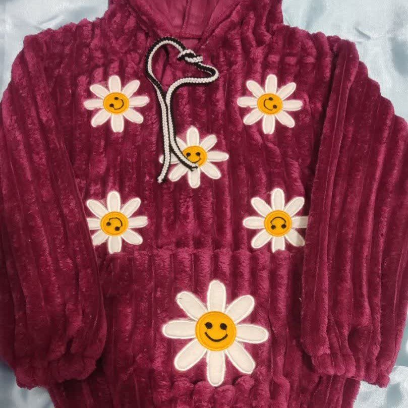 هودی دخترانه آفتاب گردان جنس پولیش کرکره ای سایز بندی 50،55 پارچه نرم ولطیف هست هزینه پست با مشتری