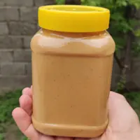 کره بادام زمینی آستانه اشرفیه درجه 1 (700گرمی)
