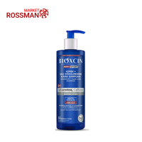 شامپو ضد ریزش مردانه بیوکسین Bioxcin مدل کافئین و آل کارنتین حجم 500 میلی لیتر