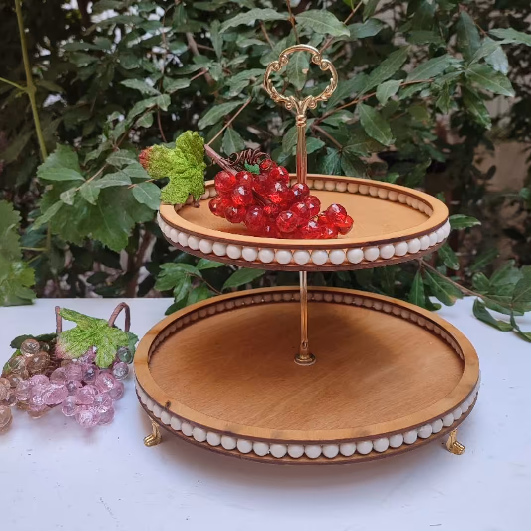 شیرینی خوری دوطبقه چوبی 

قابل شستشو
رنگ گیاهی 
مهره دار 
کیفیت عالی 
قطر بالا 20 سانت
قطر پایی 25 سانت