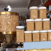 کره بادام زمینی تازه ومرغوب  کره بادام زمینی آستانه بدون افزودنی 