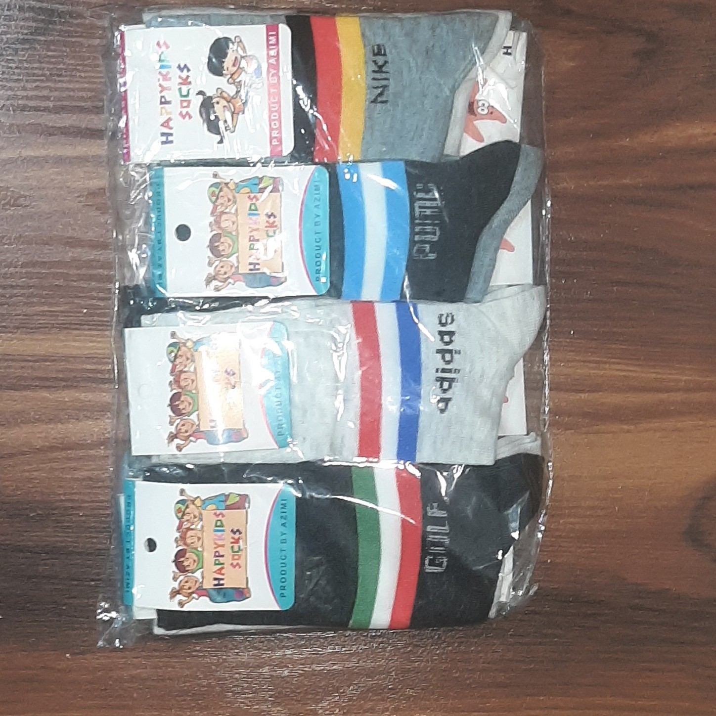 جوراب بچه گانه رینگی بسته 4سایز بسیار عالی در دو رنگ از 4سال10سال بسته 12 جفتی