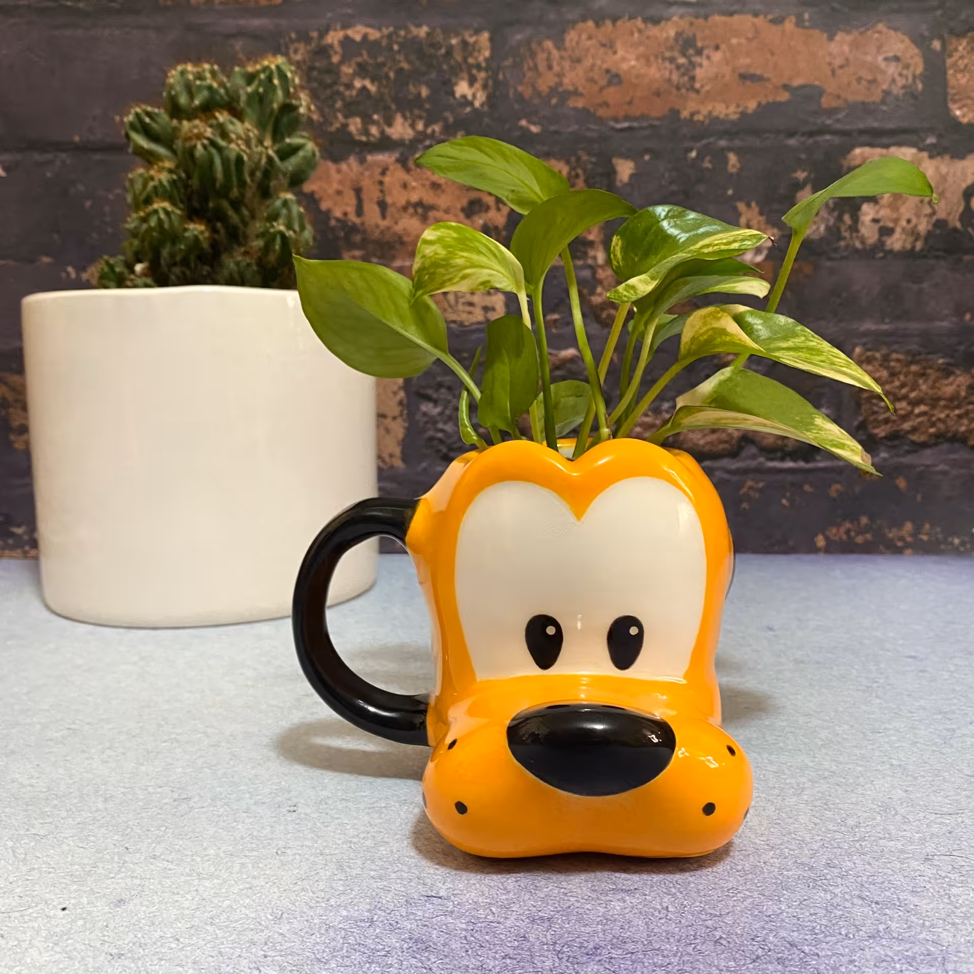 ماگ دیزنی سرامیکی طرح پلوتو رنگ نارنجی،سیسمونی