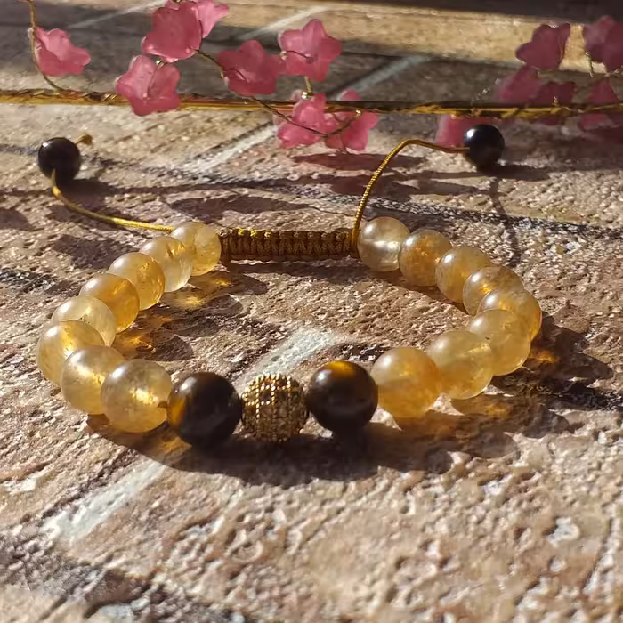 دستبند بافت با نخ ابریشمی سیترین اصل معدنی همراه با سوارسکی اصل وچشم ببر