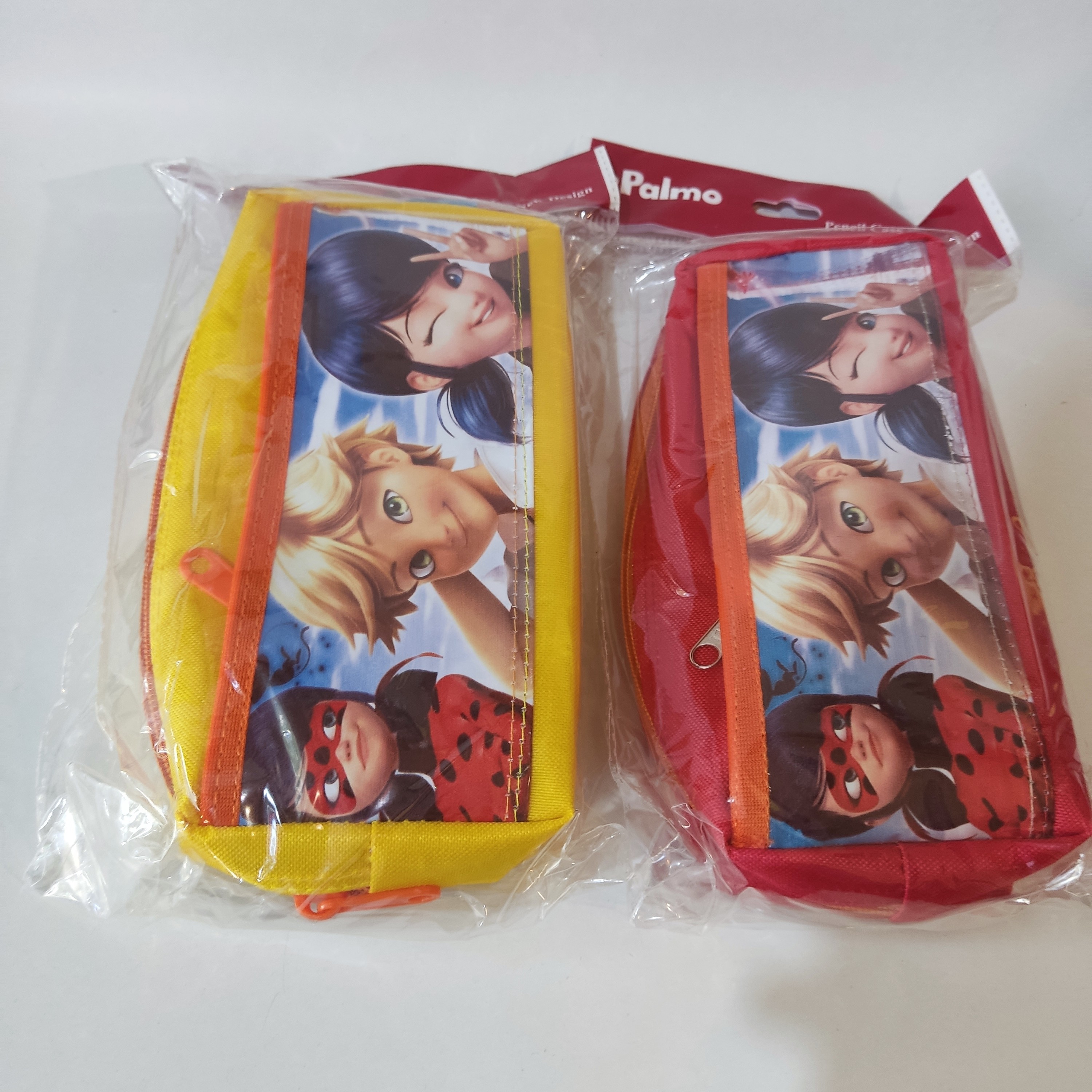 جامدادی سه زیپ کارتونی دخترانه طرح دختر کفشدوزکی